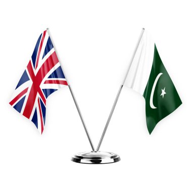 Two table flags isolated on white background 3d illustration, united kingdom and pakistan