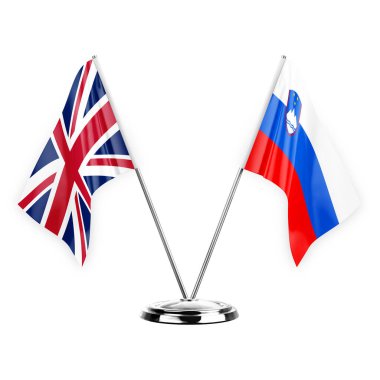 Two table flags isolated on white background 3d illustration, united kingdom and slovenia