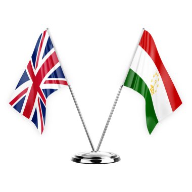 Two table flags isolated on white background 3d illustration, united kingdom and tajikistan