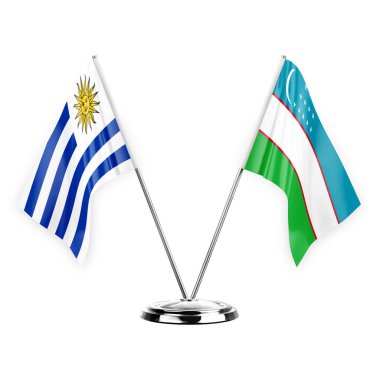 Two table flags isolated on white background 3d illustration, uruguay and uzbekistan