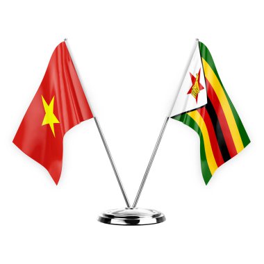 Two table flags isolated on white background 3d illustration, vietnam and zimbabwe