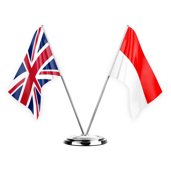 白い背景の3Dイラストに隔離された2つのテーブルフラグ イギリスとインドネシア — ストック写真