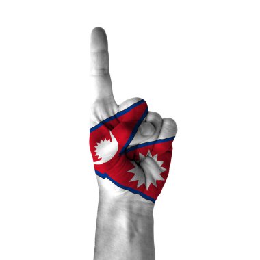 Hand pointing thumb up direction, nepal painted with flag as symbol of up direction, first and number one symbol - isolated on white background