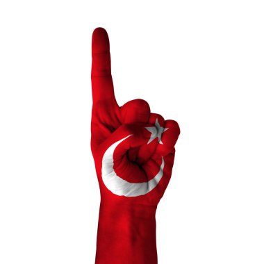 Hand pointing thumb up direction, turkey painted with flag as symbol of up direction, first and number one symbol - isolated on white background