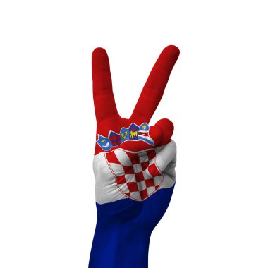 Hand making victory sign, croatia painted with flag as symbol of victory, win, success - isolated on white background