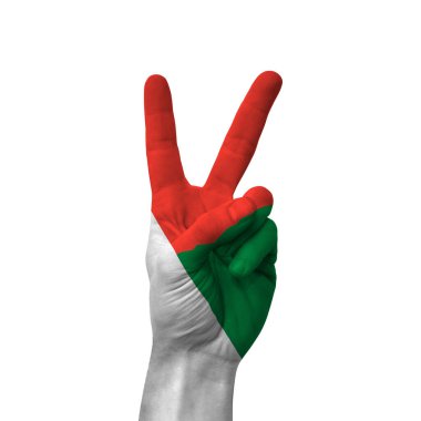 Hand making victory sign, madagascar painted with flag as symbol of victory, win, success - isolated on white background
