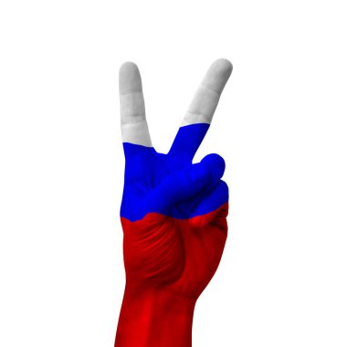 Hand making victory sign, russia painted with flag as symbol of victory, win, success - isolated on white background