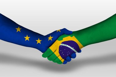 Handshake between brazil and european union flags painted on hands, illustration with clipping path.