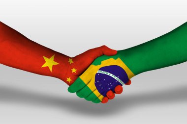 Handshake between brazil and china flags painted on hands, illustration with clipping path.
