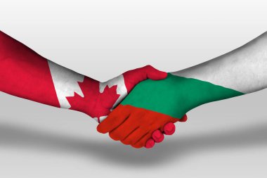 Handshake between bulgaria and canada flags painted on hands, illustration with clipping path.