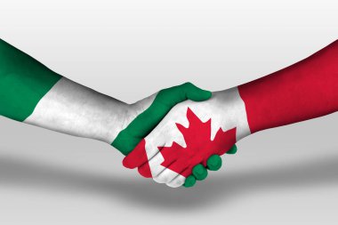 Ellerinde Kanada ve Nijerya bayrakları arasında el sıkışma, kırpma yolu olan resimler.