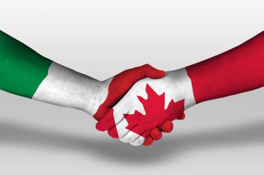 Handshake between canada and italy flags painted on hands, illustration with clipping path.