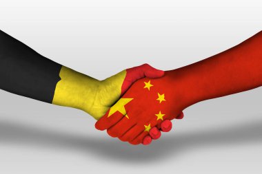 Handshake between china and belgium flags painted on hands, illustration with clipping path.