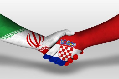Handshake between croatia and iran flags painted on hands, illustration with clipping path.