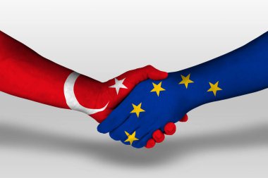 Handshake between european union and turkey flags painted on hands, illustration with clipping path.