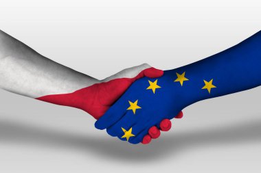 Handshake between european union and poland flags painted on hands, illustration with clipping path.