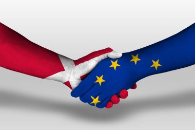 Handshake between european union and denmark flags painted on hands, illustration with clipping path.