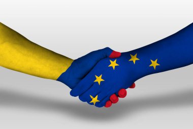 Avrupa Birliği ile Kolombiya bayrakları arasındaki el sıkışma, kırpma yolu olan resimler.