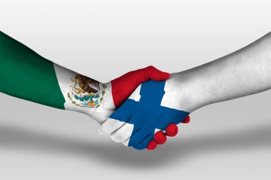 Handshake between finland and mexico flags painted on hands, illustration with clipping path.