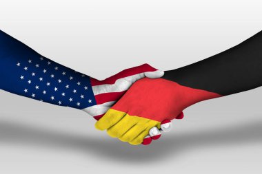 Almanya ve Amerika Birleşik Devletleri arasındaki el sıkışma ellerinde boyanmış bayraklar, kırpma yolu olan resimler.