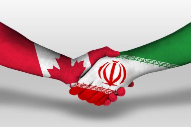 Handshake between iran and canada flags painted on hands, illustration with clipping path.