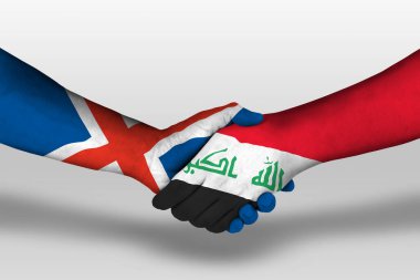 Ellerine Irak ve İzlanda bayrakları arasında el sıkışma, kırpma yolu olan resimler.