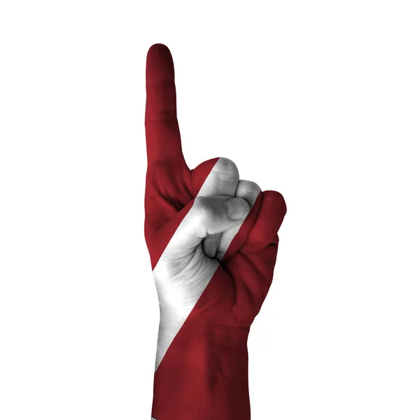 Hand Pointing Thumb Direction Latvia Painted Flag Symbol Direction First — Stok Foto