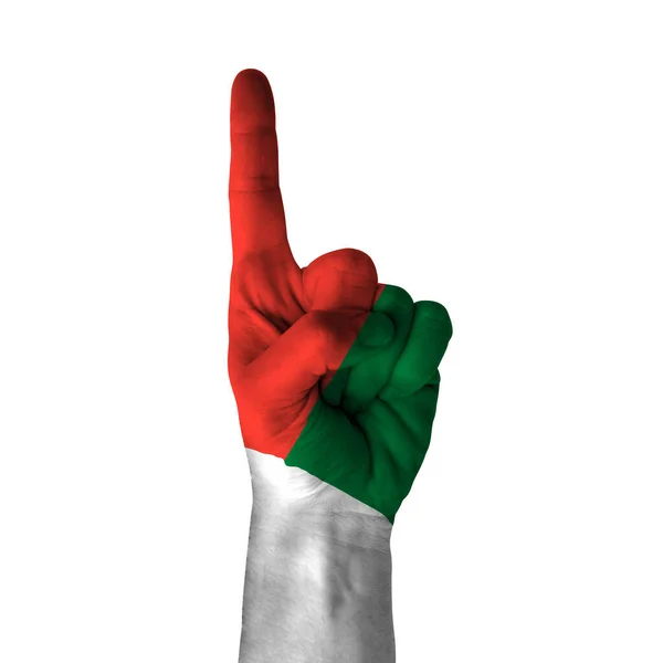 Hand Pointing Thumb Direction Madagascar Painted Flag Symbol Direction First —  Fotos de Stock