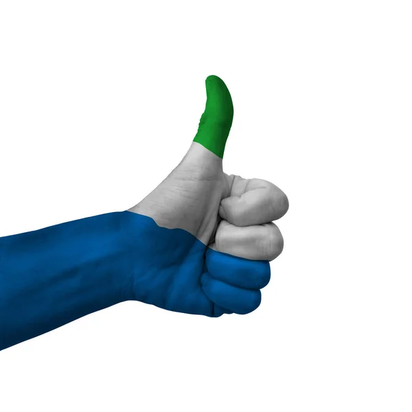 Hand Making Thumbs Sign Sierra Leone Painted Flag Symbol Thumbs — стоковое фото