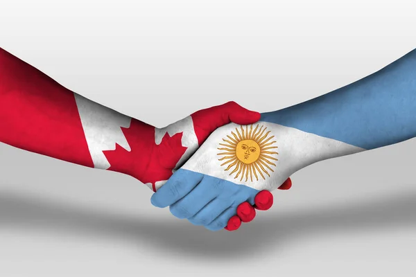 Uścisk Dłoni Między Argentyną Flagami Kanady Namalowanymi Rękach Ilustracja Ścieżką — Zdjęcie stockowe