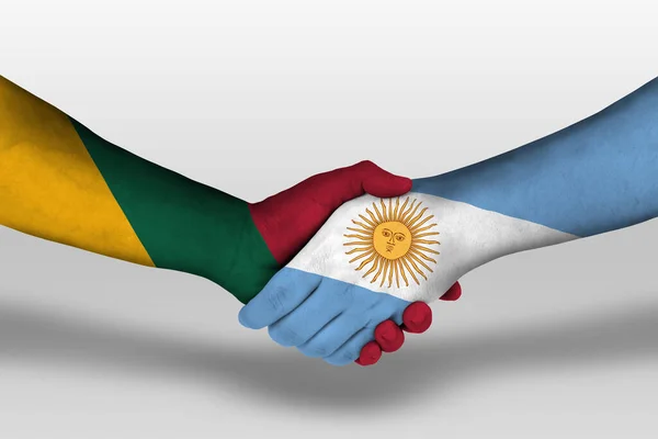 在手绘上Argentina和Lithuania国旗之间的握手 用裁剪路径说明 — 图库照片