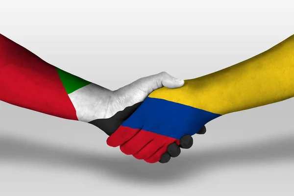 手绘在哥伦比亚和联合阿拉伯酋长国之间的握手 图上有剪接路径 — 图库照片