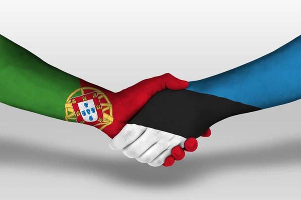 Apretón Manos Entre Estonia Banderas Portugal Pintadas Las Manos Ilustración — Foto de Stock