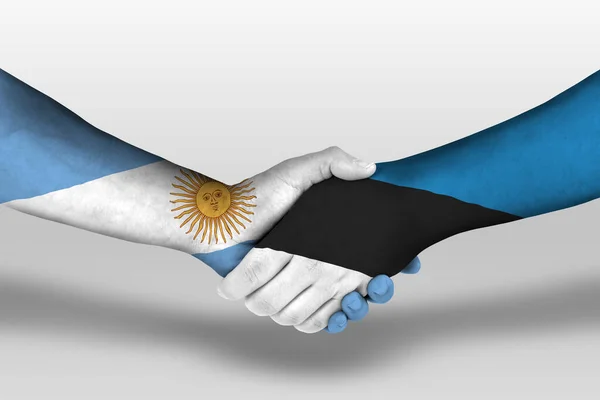 Χειραψία Μεταξύ Των Σημαιών Estonia Και Argentina Ζωγραφισμένα Στα Χέρια — Φωτογραφία Αρχείου