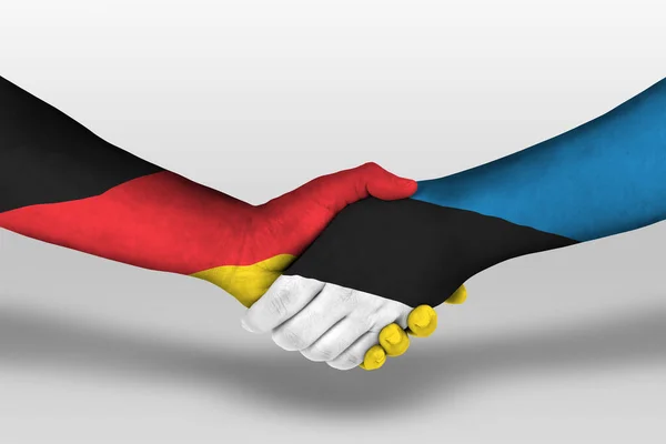 手描きのエストニアとドイツの旗の間の握手 クリッピングパスとイラスト — ストック写真