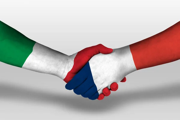 手に描かれたフランスとイタリアの旗の間の握手 クリッピングパスを持つイラスト — ストック写真