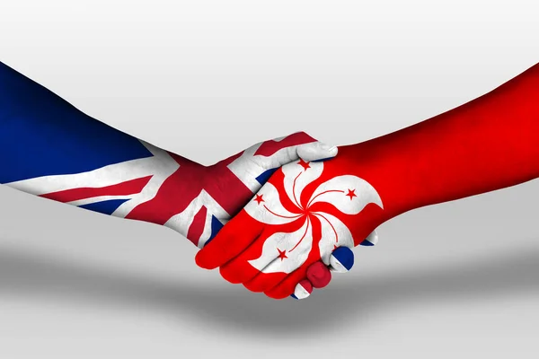 Hong Kong Birleşik Krallık Bayrakları Arasındaki Sıkışma Ellerinde Boyalı Kırpma — Stok fotoğraf