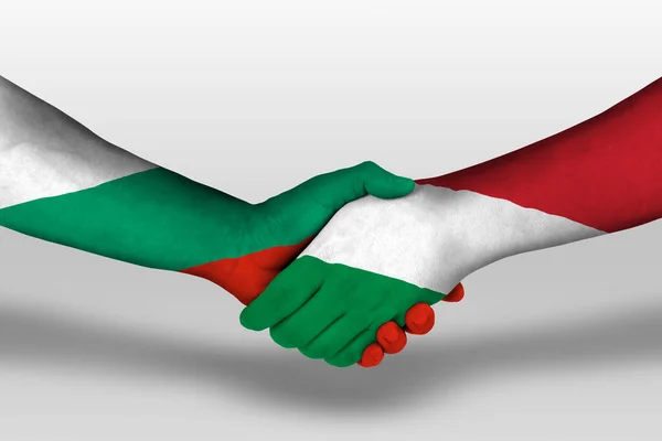 Apretón Manos Entre Las Banderas Húngaras Bulgarias Pintadas Las Manos — Foto de Stock