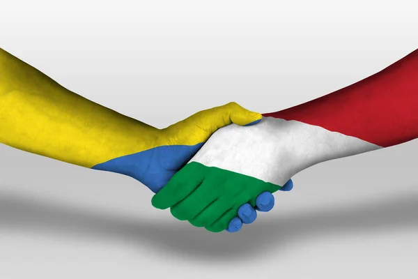 手に描かれたハンガリーとウクライナの旗の間の握手 クリッピングパスを持つイラスト — ストック写真