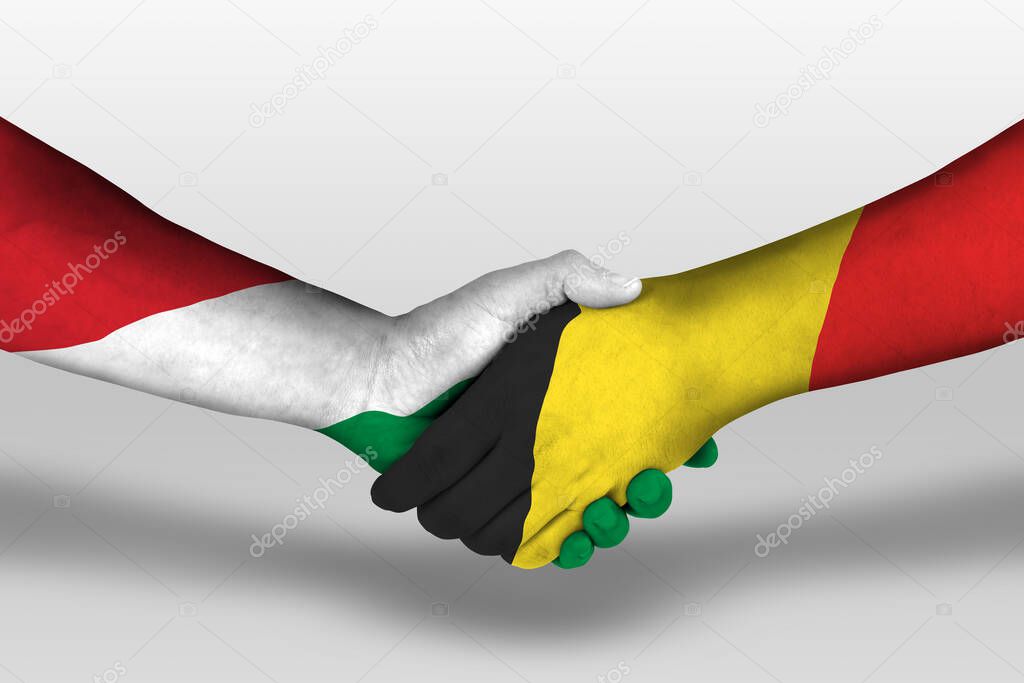 Handshake between belgium and hungary flags painted on hands, illustration with clipping path.