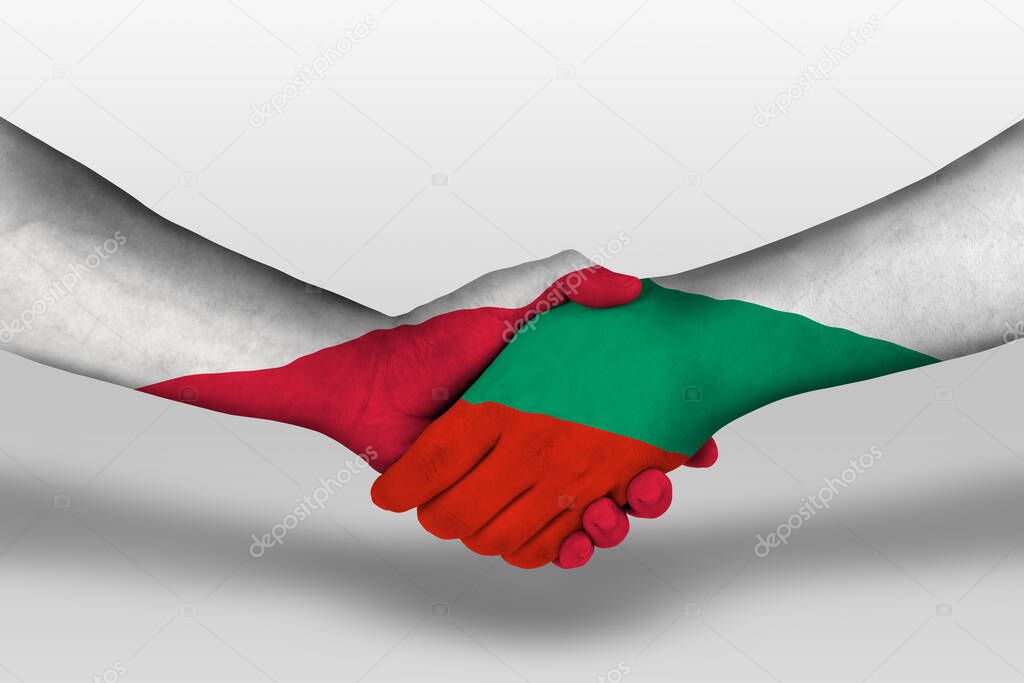 Handshake between bulgaria and poland flags painted on hands, illustration with clipping path.