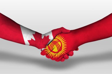 Handshake between kyrgyzstan and canada flags painted on hands, illustration with clipping path.