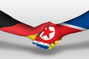 Handshake between north korea and germany flags painted on hands, illustration with clipping path.