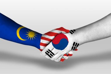 Handshake between south korea and malaysia flags painted on hands, illustration with clipping path.