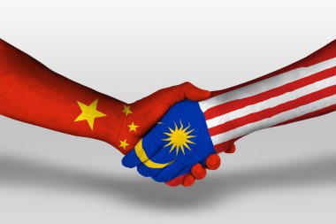 Handshake between malaysia and china flags painted on hands, illustration with clipping path.