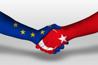 Handshake between turkey and european union flags painted on hands, illustration with clipping path.