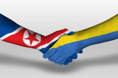Handshake between ukraine and north korea flags painted on hands, illustration with clipping path.
