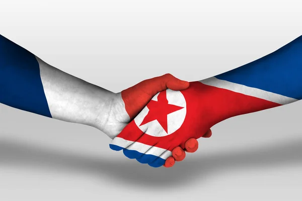 Stretta Mano Tra Corea Del Nord Bandiere Francia Dipinte Mani — Foto Stock