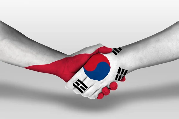 Uścisk Dłoni Między Koreą Południową Flagami Poland Namalowanymi Rękach Ilustracja — Zdjęcie stockowe