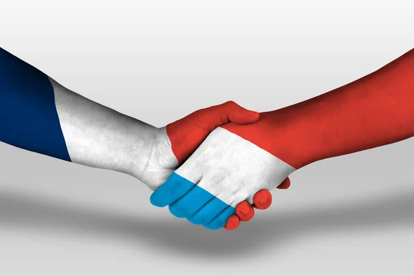 Handdruk Tussen Luxembourg Franse Vlaggen Geschilderd Handen Illustratie Met Knippad — Stockfoto